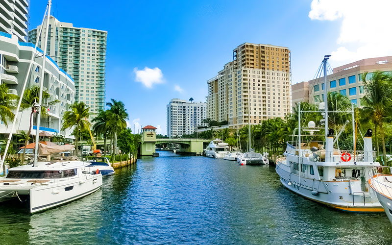 boats and buildings lining the fort lauderdale waterway