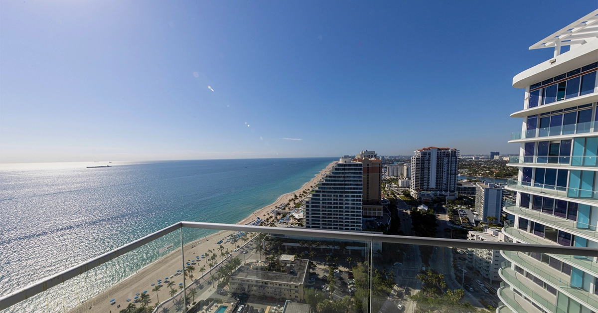 Penthouse balcony view overlooking Fort Lauderdale Beach and Atlantic Ocean.